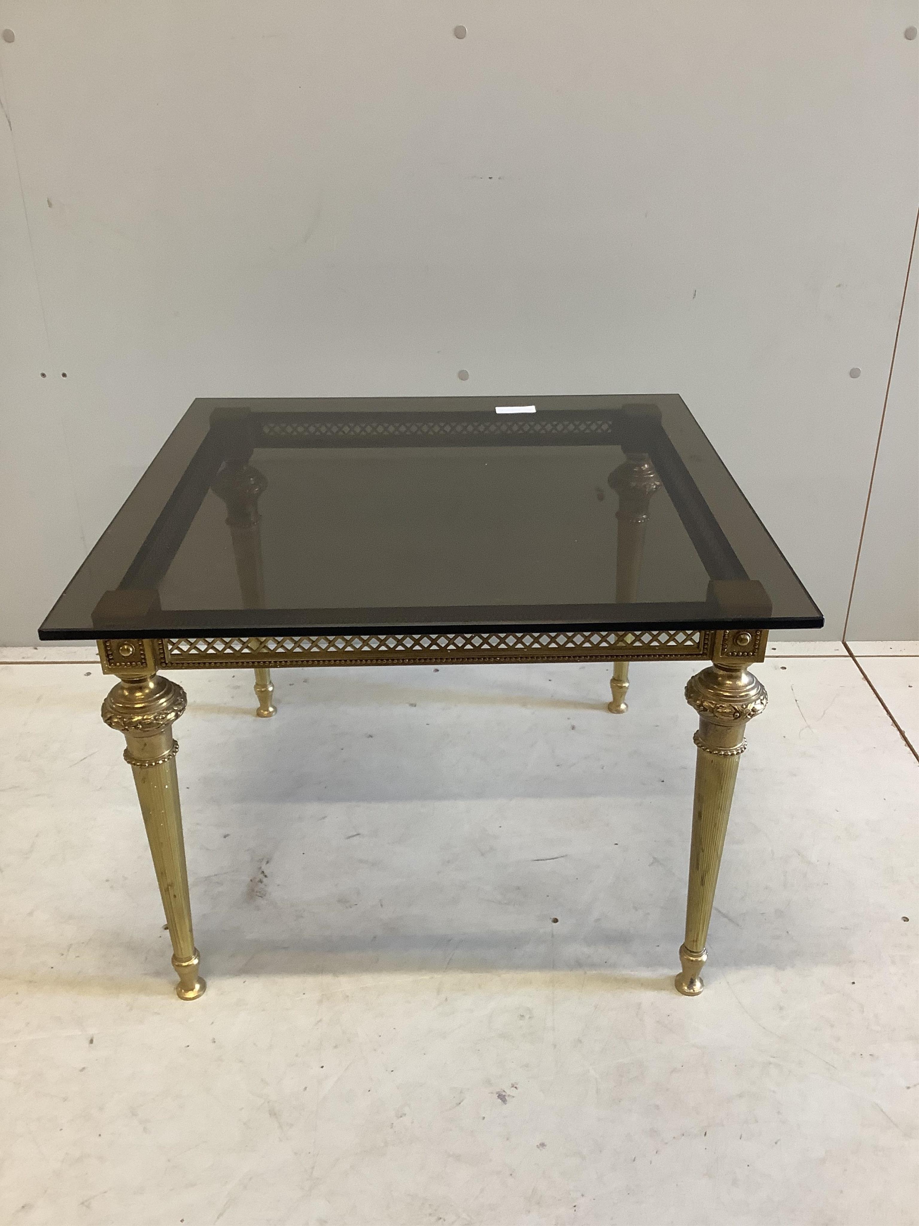 A rectangular gilt metal smoked glass occasional table, width 65cm, depth 65cm, height 46cm. Condition - good